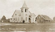 Photo of Lutheran Church and Parsonage.